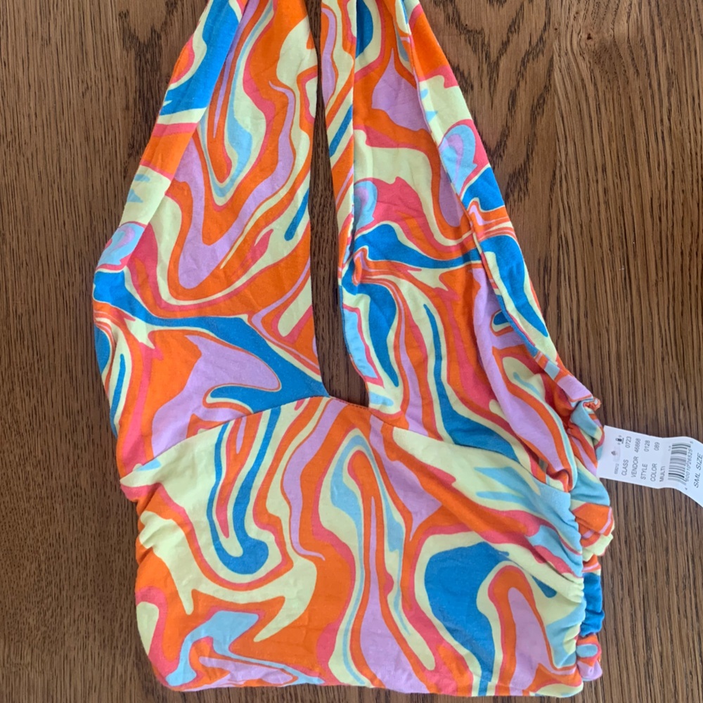 A multi colored brand new fancy halter top.